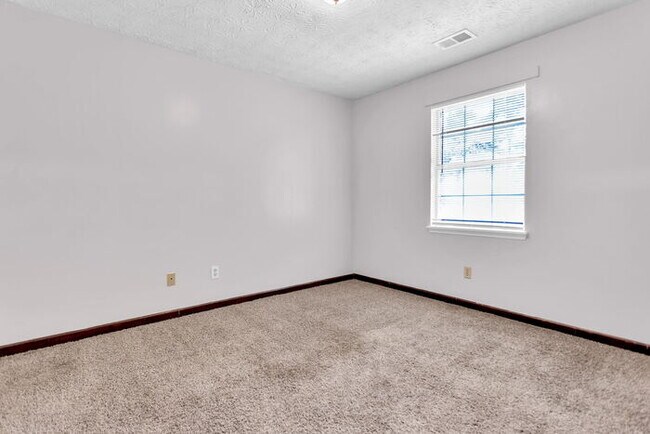 Building Photo - Upgraded Duplex with Huge Yard