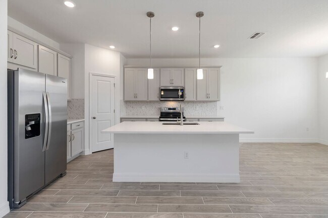 Building Photo - Beautiful Brand New Energy Efficient 4/2 C...