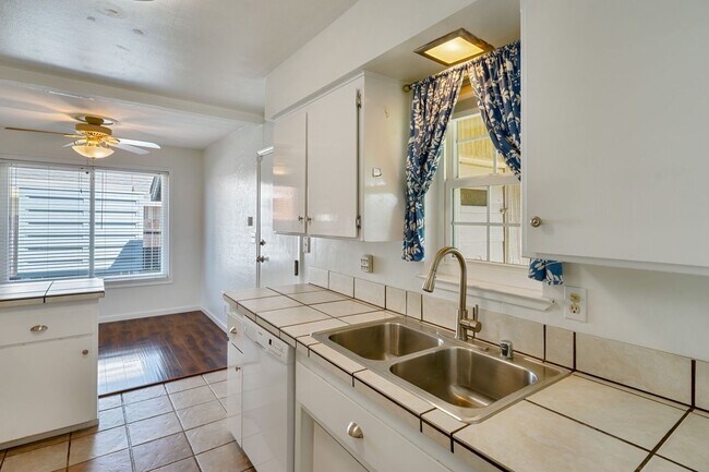 Building Photo - 3BR + Office Home in Excellent Condition with Storage Sheds and Garage Workspace!