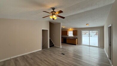 Building Photo - WEST SIDE 5 BR SPLIT LEVEL HOME AVAILABLE NOW!