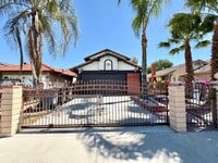 Building Photo - Gated 3 Bedroom 2.5 Bath Home with Bonus Room & Private Balcony
