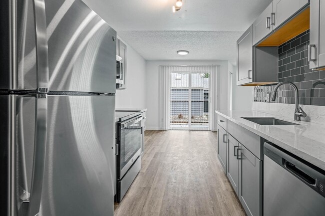 Building Photo - Oak & Iron Flats by Trion Living