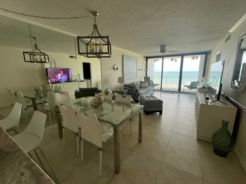 Living room has new sliding balcony sliders. New Sheet rock will be installed - 10102 S Ocean Dr