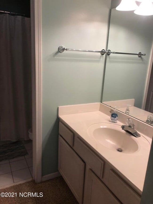 Building Photo - FULLY FURNISHED CONDO in sought-after Sea Trail subdivision!