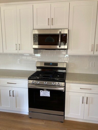 New Range & Microwave - 507 N Helberta Ave