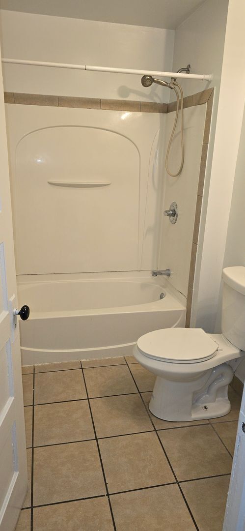 Building Photo - Large remodeled 4 bedroom with off street parking available