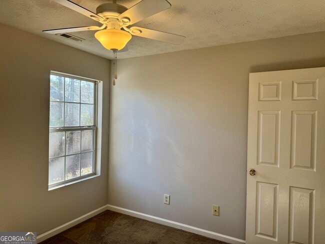 Building Photo - 5663 Windfall Ln