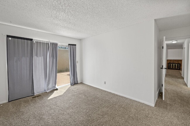 Building Photo - Close to Fort Carson and Cheyenne Mountain, 3 bedroom townhome with 2 car garage.