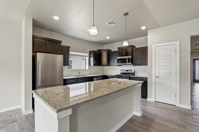 Building Photo - 14740 Mike a Mendoza Ave