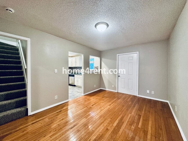 Building Photo - Adorable Home Featuring Wood Floors, SS Ap...