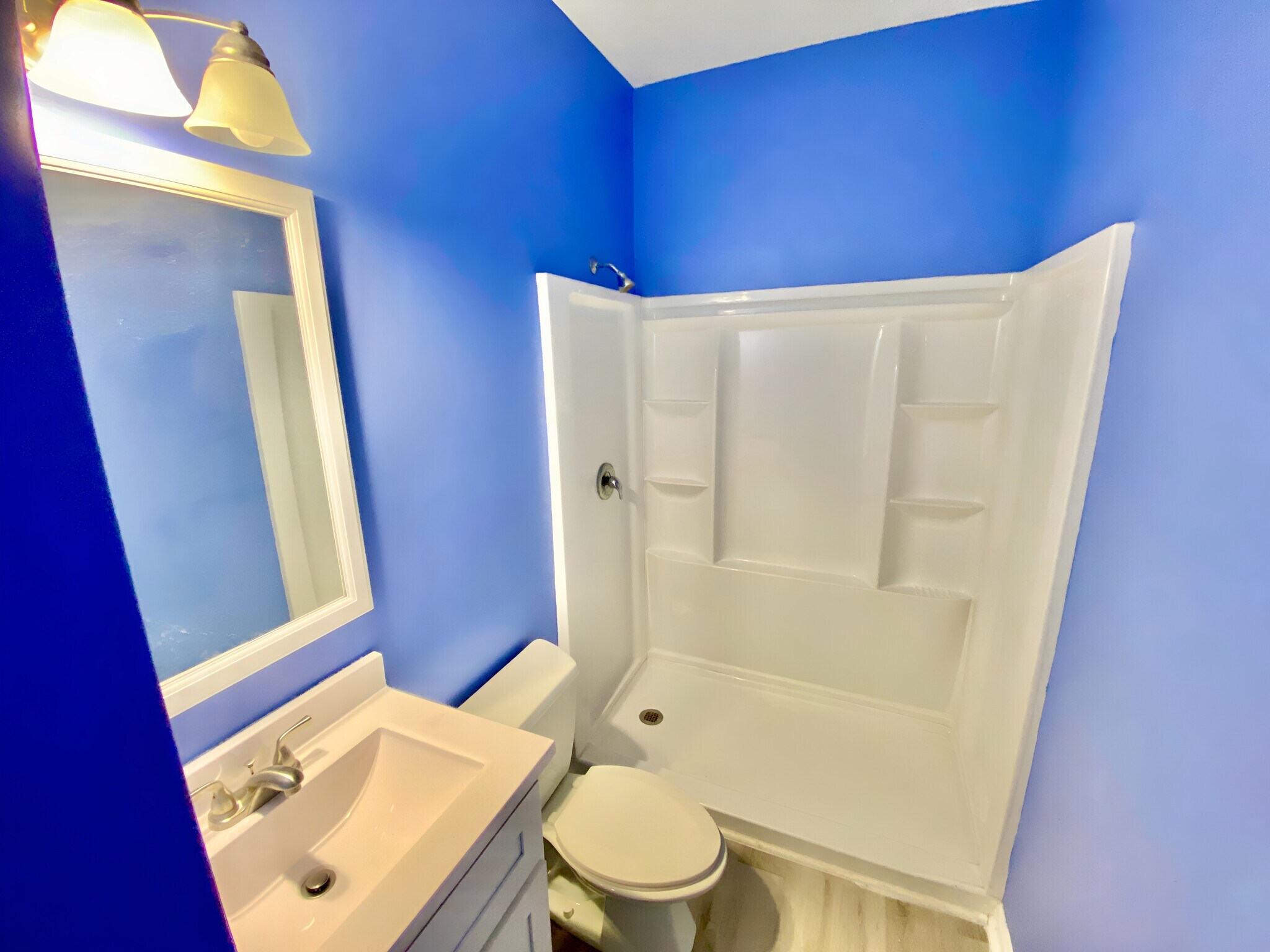 En-suite bathroom, upgraded walk-in shower. - 4240 Wilshire Blvd