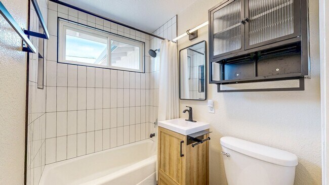 Building Photo - Bright Newly Refurbished Two Bedroom One Bath Single Family Home