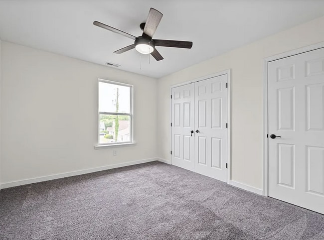 Building Photo - 4 Bedroom Home with Main-Level Primary and Fenced Backyard