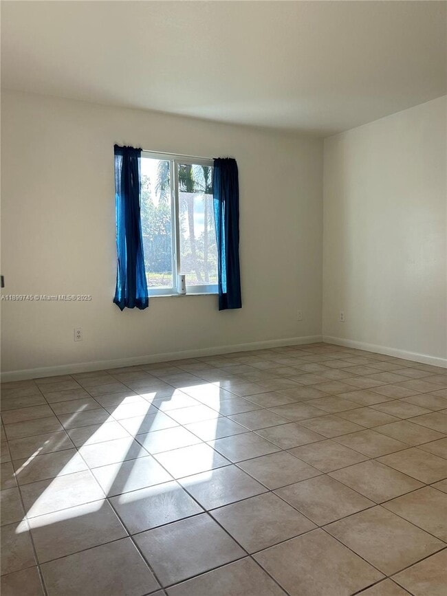 Building Photo - 6452 Royal Palm Beach Blvd