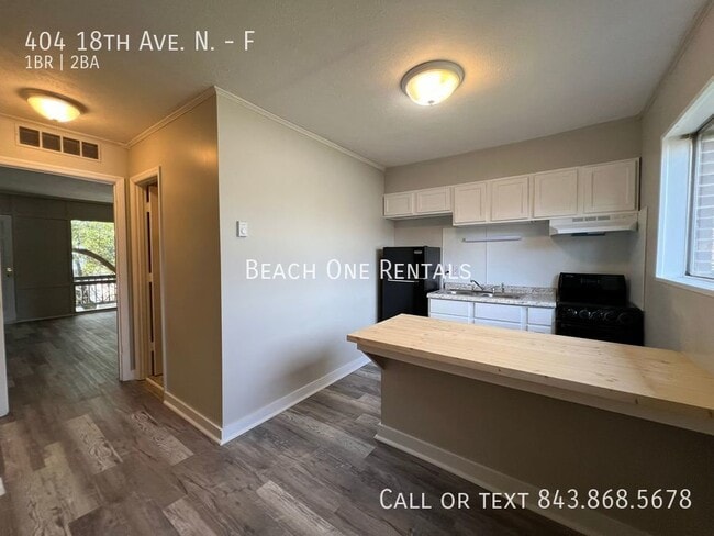 Building Photo - 404 18th Ave N