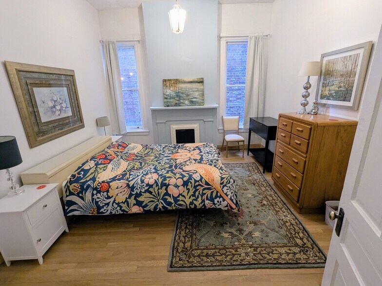 Bedroom 2 is about 14'x12' so plenty of room, yet with lots of drawers to put things away. - 1816 W Grace St