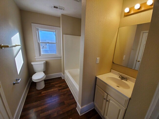 Building Photo - Rental home with deck, garage, and great backyard!