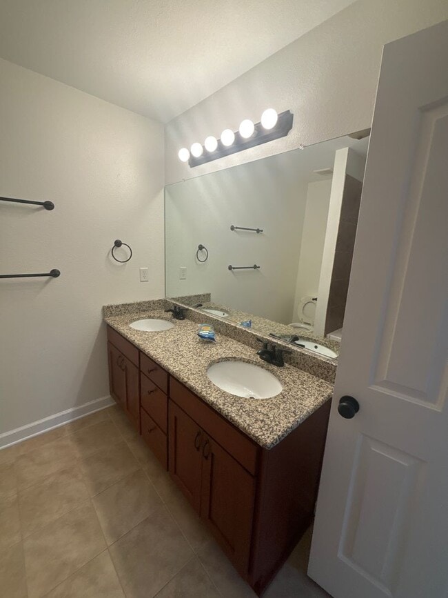 Building Photo - Spacious 4-Bedroom Home Near Base – No Tun...