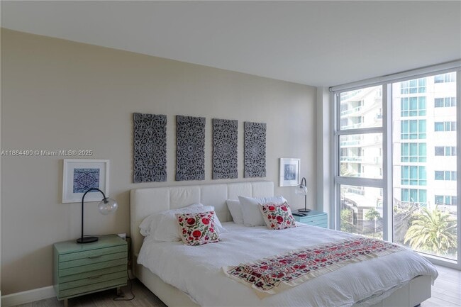 Building Photo - 10275 Collins Ave