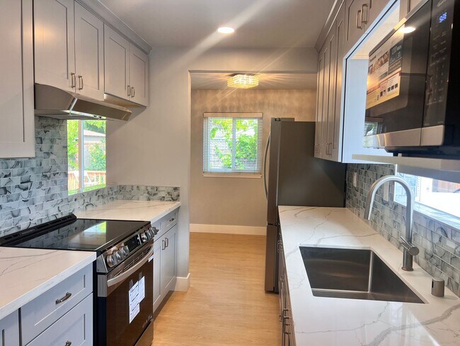 Building Photo - Completely Remodeled 4 Bedroom Home with C...