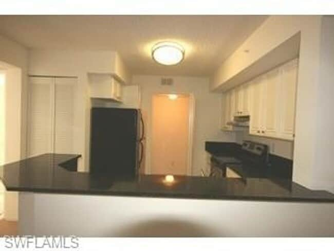 Building Photo - ANNUAL RENTAL 1 BED + DEN/1 BATH AT IBIS CLUB