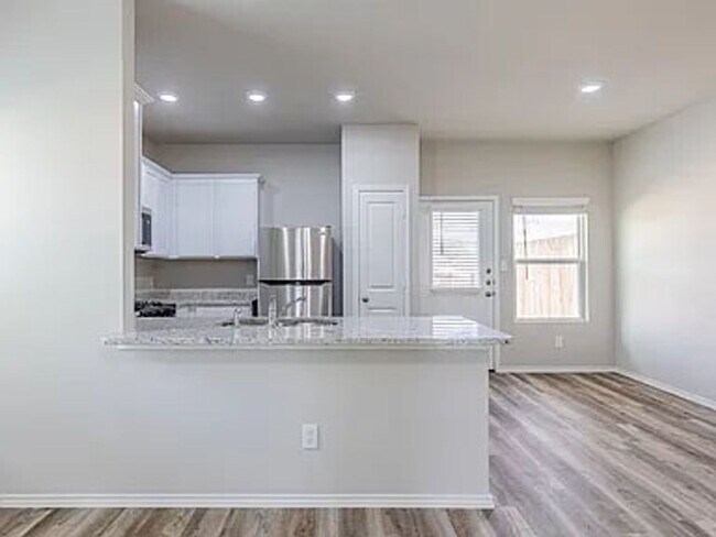 Building Photo - **Discover Elevated Living at Hunters Ranch!**