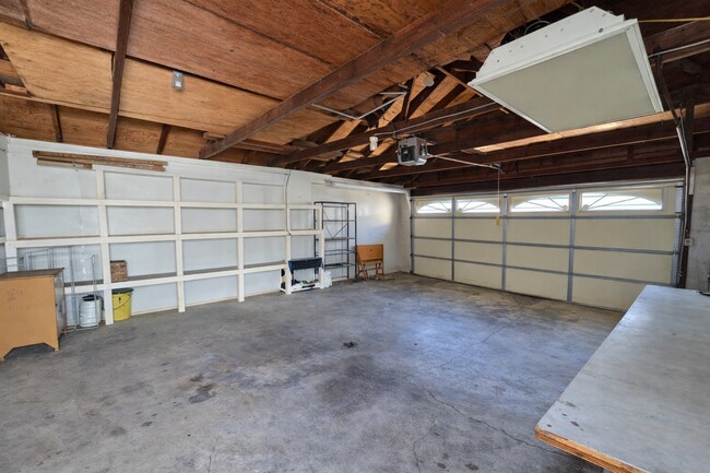 Building Photo - SPACIOUS 3 Bedroom, 2 bathroom home with basement and garage