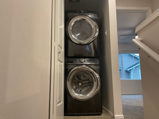 Building Photo - Riverfront Townhome with Tandem Garage & Fenced Yard