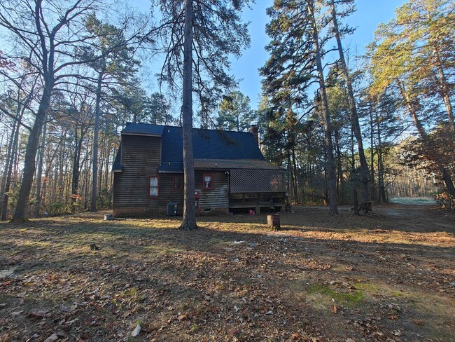 Building Photo - # bedroom home nestled in the woods