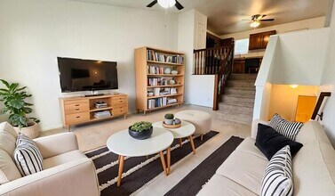 Building Photo - Creekwood Park Townhomes - Reduced rent + claim your choice of a brand-new 55" TV or a $250 Amazo...