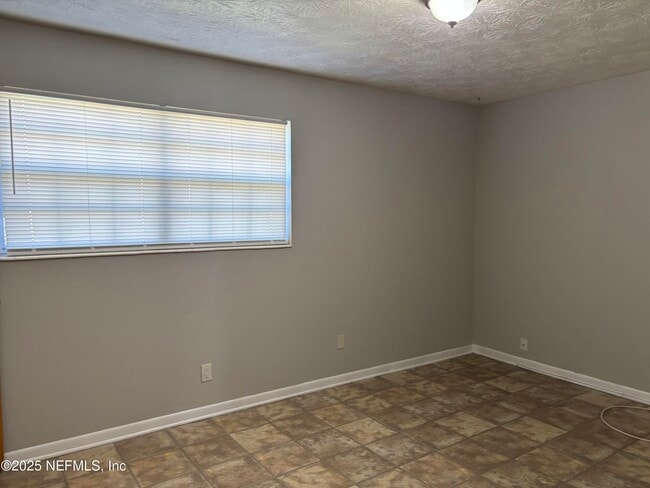 Building Photo - 7430 Jade Dr N