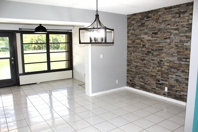 Building Photo - 9955 Papaya Tree Trail