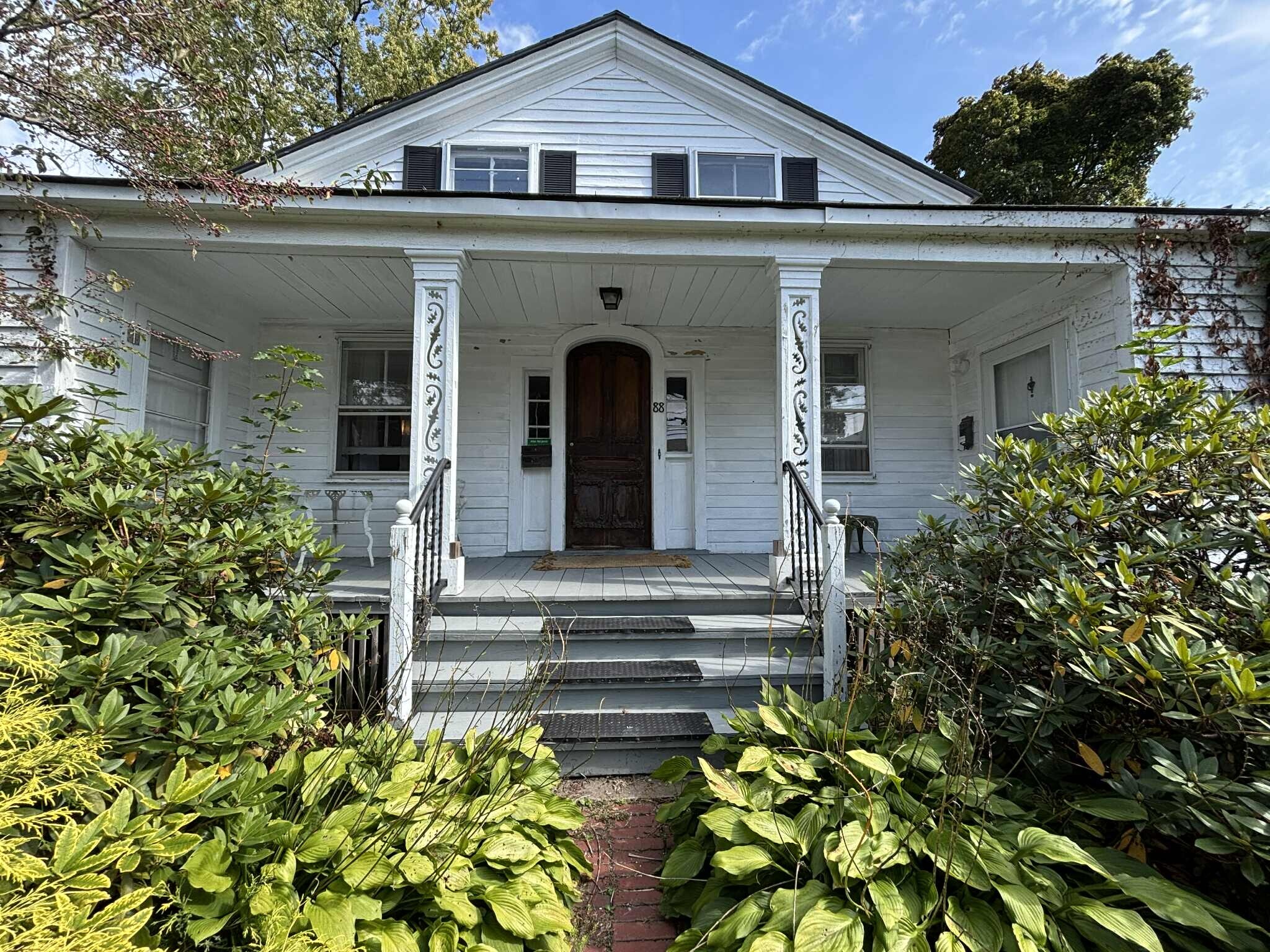 Exterior front. Sunny porch - 88 S Willard St