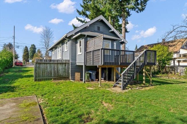 Building Photo - Spacious Tacoma Rental Featuring Large Yard & Entertainer’s Deck