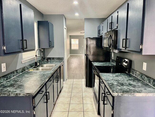 Building Photo - 8778 Buzz Ct