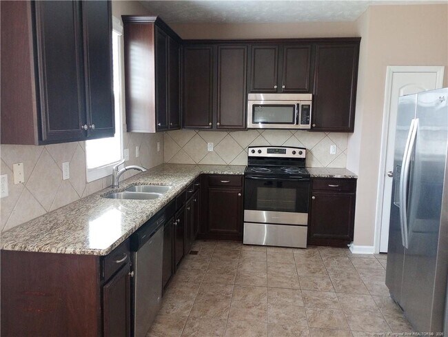 Building Photo - 6031 Geranium Dr