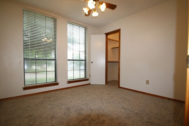 Building Photo - Corner Lot Charmer Off Chapel Creek | 4BR/2BA with Fireplace, Garden Tub & Fenced Backyard