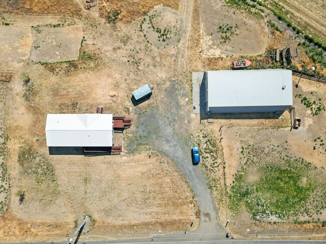 Building Photo - Country Living with a Huge Shop - 3BR on Acreage, Livestock Welcome!