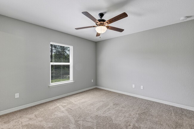 Building Photo - Freshly Painted 3BR Home with Spacious Yard, Modern Baths & No Deposit Option!