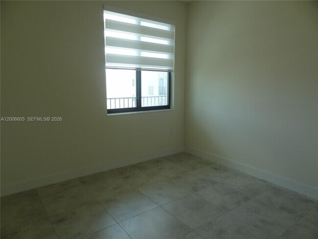 Building Photo - 4670 NW 84th Ave