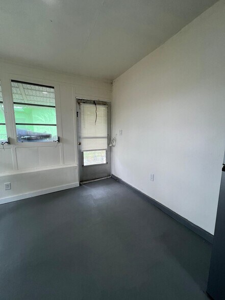 Building Photo - 6980 NW 25th St