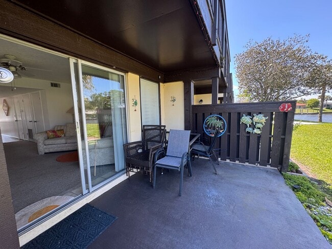 Building Photo - FULLY FURNISHED 2-Story Townhouse on Canal – Pool, Golf Views & ALL Utilities Included!