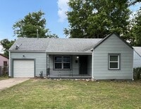Building Photo - Adorable 2 bedroom 1 bathroom home with a garage!