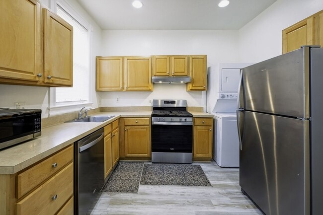 Building Photo - Historic & Charming 3BR Rowhouse near Howard is Move-in Ready!