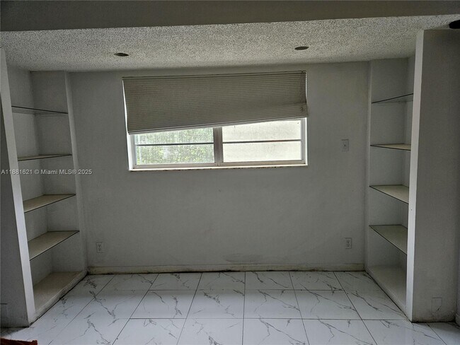 Building Photo - 11131 Royal Palm Blvd