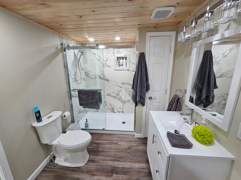 Entry to Full Downstairs Bath with a full Laundry - 8152 Wilson Karr Rd