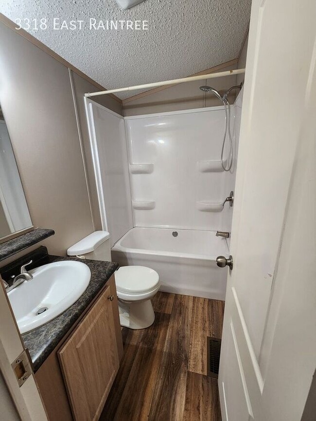 Building Photo - 3318 East Raintree-