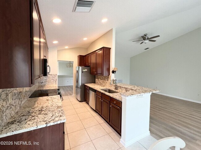 Building Photo - 6600 White Blossom Cir