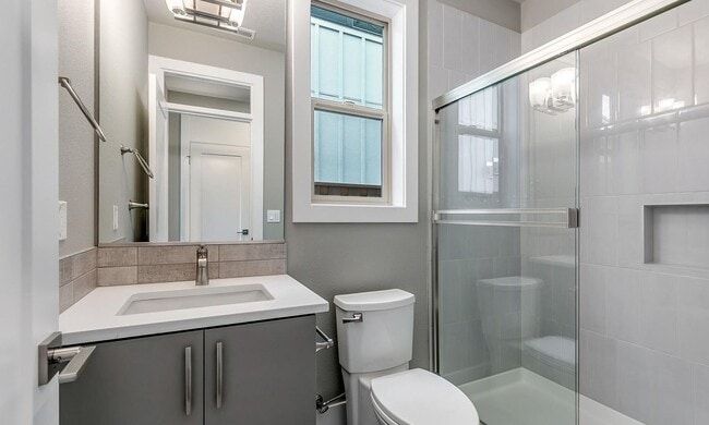 Building Photo - Bethany Stunner - 5 Bedrooms with Main-Level Bed & Bath, Modern Kitchen & Private Fenced Yard