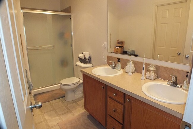 Building Photo - Spacious End-Unit 3-Bedroom Townhouse with 2-Car Garage & Central AC